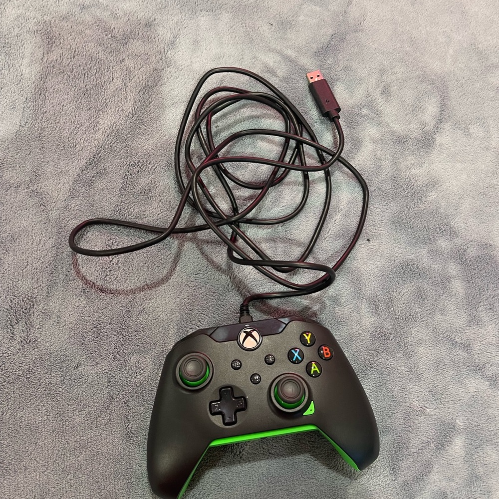 Black and green Xbox wired controller